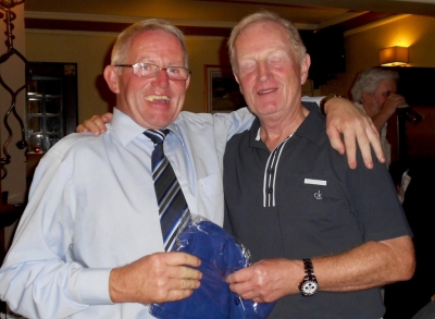 Don Spollen
Don Spollen can't keep his eyes open after a gruelling round that brought him second place in Category 1 and a prize for Nearest the Pin at 102 centimetres. Seen here leaning on sponsor Gay Smith for support.
