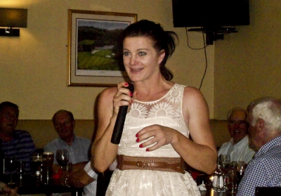 Noeleen Doyle Smith
The Captain's better half, Noeleen, was prevailed upon to take the microphone and sang the first eight verses of the "Four Green Fields", a reminder of her husband's round at Rathsallagh.
