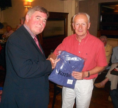 President Jim Murray presents the prize for 2nd in Class 3 to Ger O'Hea
