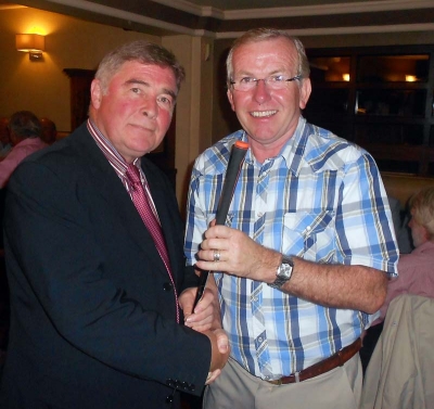 President Jim Murray present the prize for the best front 9 to Sean Murtagh
