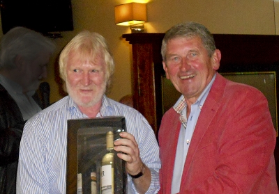 Brian Smith
Best Back 9, Brian picks up the reward from President Eamon Field
