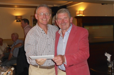 Leo Lennon Maher
He might be out of the Matchplay but he is forging ahead in this Year's Player of the Year league - Leo Lennon Maher getting his prize for nearest the pin in two from President Eamon Field. The prize was sponsored by Paul O'Gorman.
