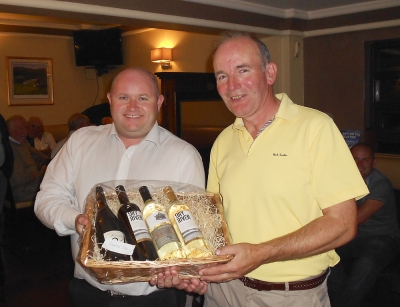 Bernard Tully
Captain Jonathan Smith presenting the runner-up prize to Bernard Tully
