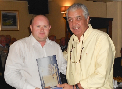 Denny Byram
Captain Jonathan Smith presenting the prize for nearest the Pin to Denny Byram
