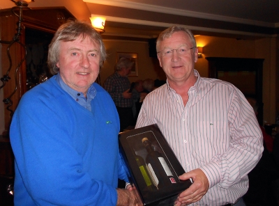 Mick McKenna & Kieran O'Brien 
Sponsor Mick McKenna presents  Kieran O'Brien with his prize for nearest the pin.
