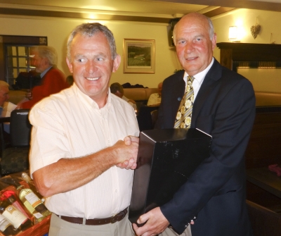 Larry Keegan - winner of Division 3
Larry receiving his prize from William Fitzgerald
