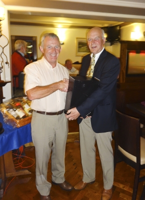 Larry Keegan - winner of Division 3
Larry receiving his prize from William Fitzgerald
